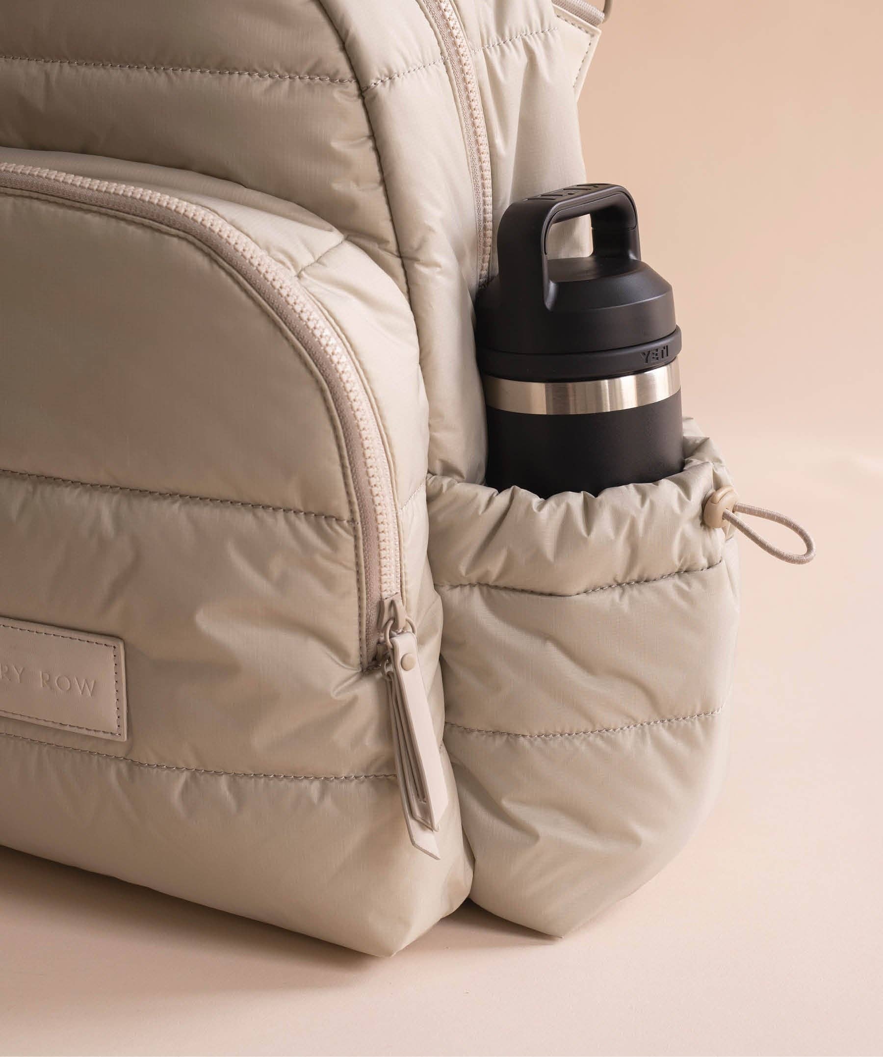 Avery Row Baby Changing Backpack - Oyster