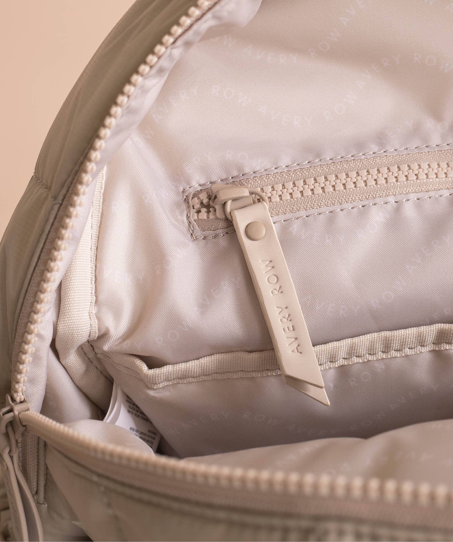 Avery Row Baby Changing Backpack - Oyster